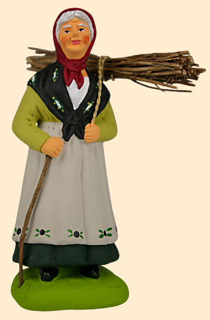 WOMAN w. A BUNDLE OF WOOD