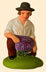 MAN CUTTING LAVENDER KNELT