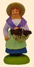 WOMAN HARVESTING GRAPES
