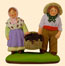 COUPLE D'ENFANTS AU PANIER DE RAISIN