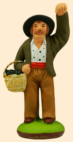 MAN GATHERING OLIVES