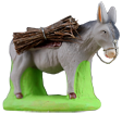 DONKEY CARRYING BUNDLES OF WOOD