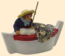 PÊCHEUR DANS LA BARQUE