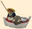 PÊCHEUR DANS LA BARQUE