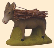 DONKEY CARRYING BUNDLES OF WOOD