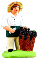 MAN HARVESTING GRAPES