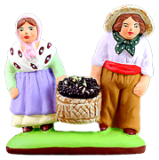 COUPLE D’ENFANTS AU PANIER DE RAISIN