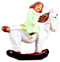 LITTLE GIRL ON ROCKING HORSE